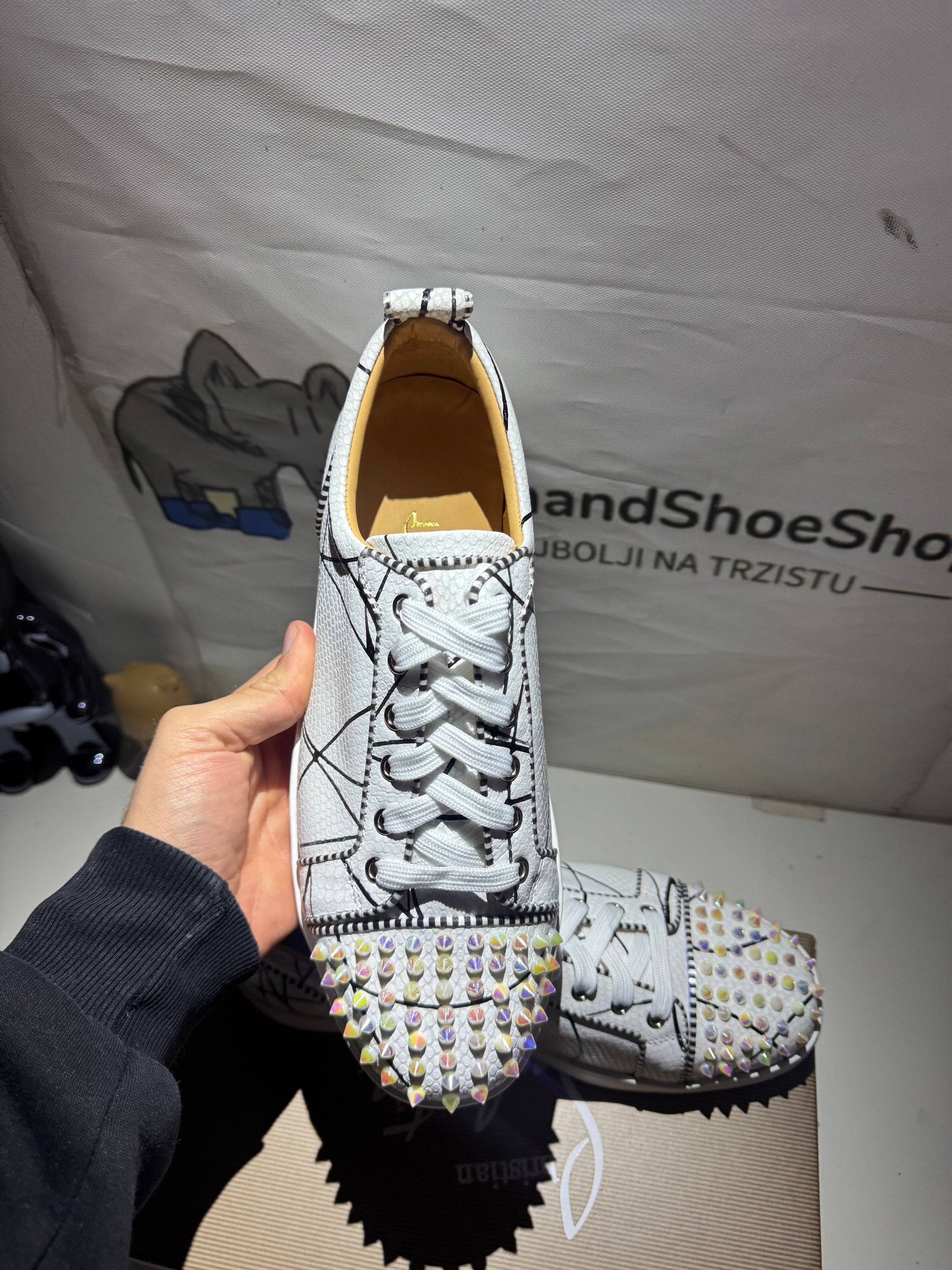 Louboutin White tenisice — straga
