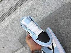 Air Jordan 1 Mid "University Blue" tenisice — straga